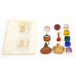 A collection of eight hardstone and coloured glass unmounted seals, inscribed 'Louisa', 'Fanny' etc;