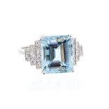 An aquamarine and diamond, platinum ring, the rectangular aquamarine measuring approx 11.89mm x 9.