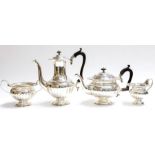 An early Victorian style silver matched four piece tea and coffee service comprising tea & coffee