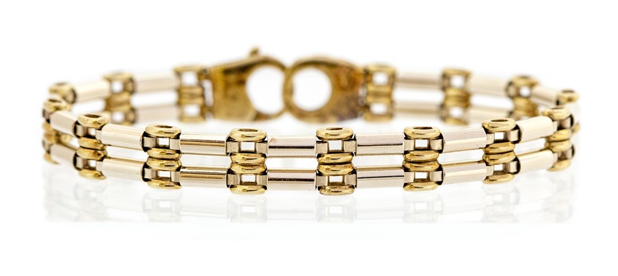 A 9ct gold two-tone fancy link bracelet, comprising white gold  double bar links with alternate gold