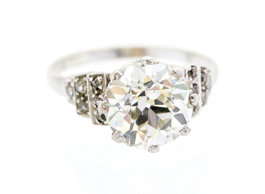A diamond and 18ct white gold solitaire ring, the old European-cut approx 3.4 carats, assessed