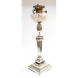 An Edwardian large table oil lamp, hobnail cut bulbous reservoir above Sheffield plate Neo-Classical