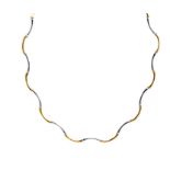 A 9ct gold fancy two tone necklace, with curved alternate links of yellow and white gold,  length