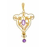 An Edwardian amethyst and seed pearl 15ct gold pendant, the open work pendant set to the centre with