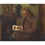 E.E. Clark (British, late 19th/early 20th Century), a man reading a magazine by a fireside, signed