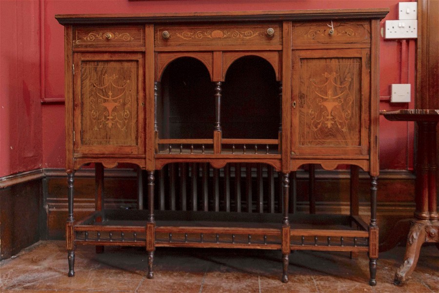 A late Victorian rosewood inlaid sideboard, c.1880, fitted with three drawers, with two doors to