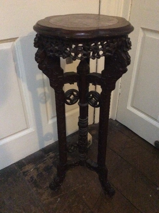 A 19th Century Chinese marble inset hardwood jardinière stand, frieze carving in tripod for saber