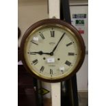 Smiths, Enfield, London; A cased, mahogany, round wall clock, Roman numerals, face approx. 30cm,