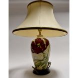 A 20th Century Moorcroft table lamp with shade, height to top of lamp, approx. 34cm, with shade,