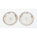 A pair of Continental 800 standard circular silver salvers, monogrammed, 9.29 ozt approx