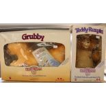 Teddy Ruxpin Talking Bear and Talking Grubby by Worlds of Wonder, both boxed, untested.