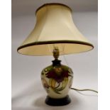A modern Moorcroft table lamp, with shade, height to top of lamp, approx. 27cm, with shade,