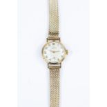 A ladies Zenith 9ct gold bracelet watch, round champagne dial, Swiss mechanical wind, inscription to