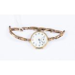 An early 20th Century ladies 9ct rose gold mechanical wind wristwatch, on an unmarked expanding