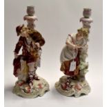 A pair of late 19th Century figurines, candlestick holders together with four Victorian