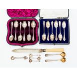 Two sets of cased silver spoons, six in each case, plus one EPNS bread knife and six small spoons