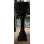 A brown lead glazed ceramic jardiniere on stand, height approx. 77cm.