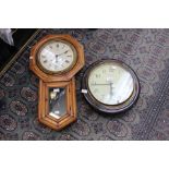 Smiths, Enfield, London; A pair of wall clocks, early 20th Century, one bearing Roman numerals,