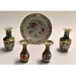 An 18th Century Chinese export plate; together with four late 19th Century Chinese vases,