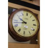 E. White, 20 Cockspur St, London; A 20th century, mahogany, round wall clock, face approx. 30cm,