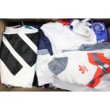 A collection of assorted football memorabilia to include; three England tracksuits; Liverpool Home