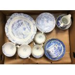 An early 19th Century collection of ceramics to include: blue and white tea bowls, saucers, cups;