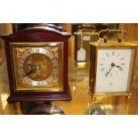 A Cope Jewellers, Quartz, battery operated carriage clock; together with an Elliott, London,