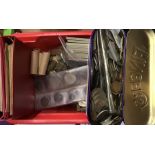 Uk and World Coins in one red plastic container.