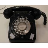 A black plastic 1960's converted dial telephone