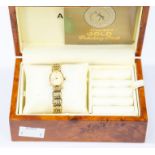 A 9ct gold Accurist ladies wristwatch, oval cream dial, with 9ct gold bracelet strap, total gross