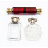 Three scent bottles, two silver mounted [3]
