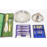 A collection of plate/EPNS including boxed flatware; a Georgian style chamber stick and snuffer