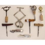 A collection of corkscrews and a spirit pourer, to include Perfect Brevete SCDG (9)
