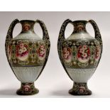 A pair of circa 1920's Japanese Satsuma twin handled vases, enamel decoration, height approx.
