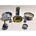 A collection of eight Oriental blue and white pieces to include: bowls, vases and others. (8)