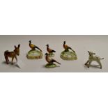 A collection of six Beswick figures to include: Donkey; Foal, two Pheasant ashtrays, and two further