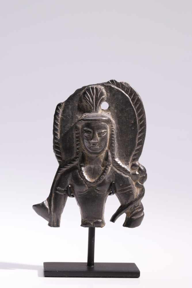 Bust of PadmapaniBronzeSwat-Valley, 6th - 7th centuryH: 7 cmA bust of the „lotus holder“ with a