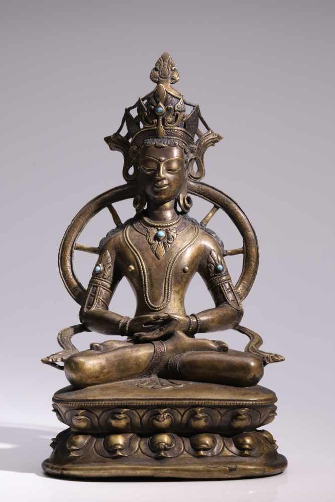 AmithabaBronze with Inlays,Tibet, 16th century,H: 29 cmA sitting Buddha Amithaba on double lotus