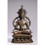 AmithabaBronze with Inlays,Tibet, 16th century,H: 29 cmA sitting Buddha Amithaba on double lotus