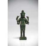 LokeshvaraBronzeCambodia12th ctH: 15 cmThis four-armed lokeshvara is holding a lotus bud, a bumpa,