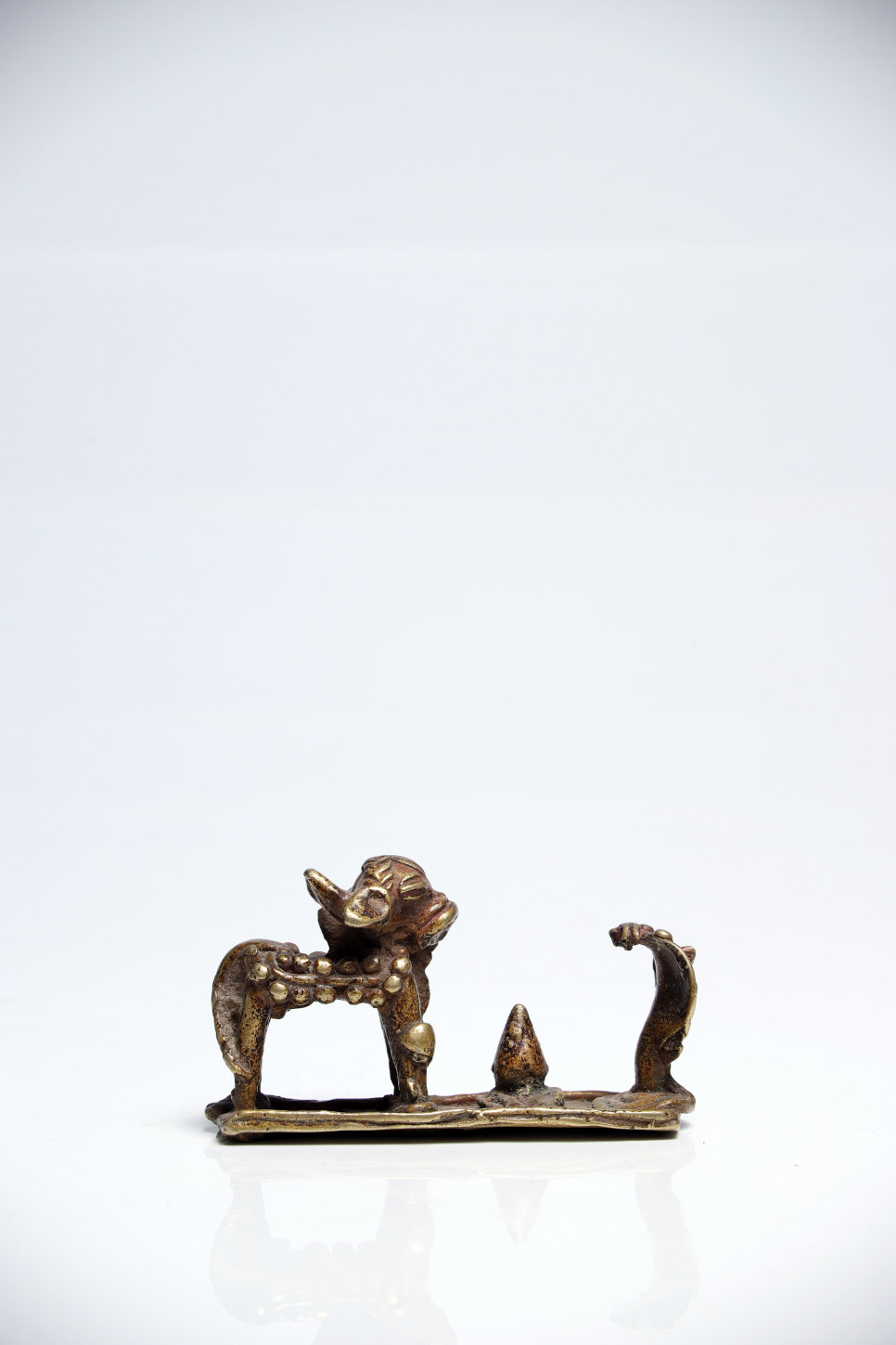 House ShrineBronzeIndia18th ctH: 5 cmLittle house shrine probably depicting Nandi the white bull and