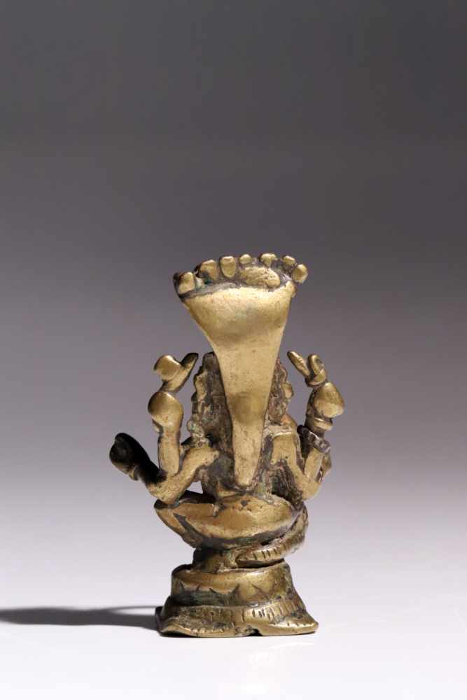 GaneshaBronzeIndia17th ctH: 7 cmA four-armed Ganesha god sitting wide-legged on a conic base. He - Image 4 of 5