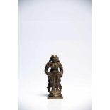 Female DeityBronzeIndia16th ctH: 8 cmA standing deity dressed in dhoti, holding two objects in