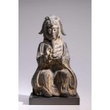 Daoist TeacherBronze,China, 18th century,H: 25 cmA sitting Daoist in long robes and with