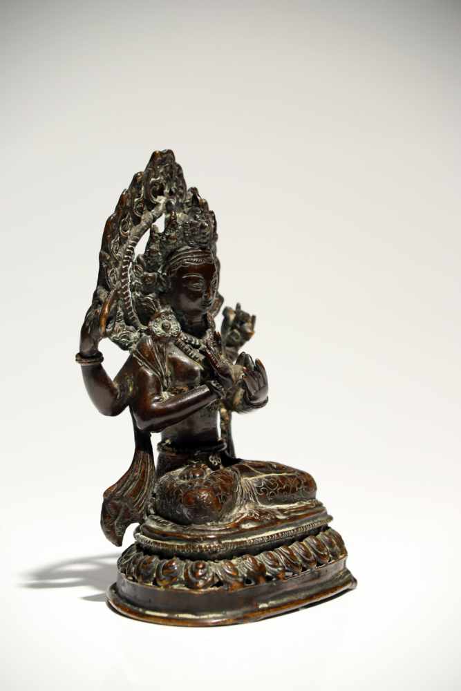 ShadakshariBronzeTibet19th ctH: 16 cmAvalokiteshvara Shadakshari sitting in padmasana (lotus pose) - Image 2 of 5