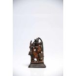 DurgaBronzeIndia14th ctH: 8 cmThis little Bronze figure shows Goddess Durga with her mount, the