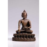 BuddhaBronze,Tibet, 16th century,H: 13 cmBuddha Shakyamuni on double lotus base. The right hand is