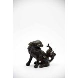 Fu-DogBronzeChina18th ctH: 9 cm Fu-Dogs are often situated at temple entrances as guardian lions.