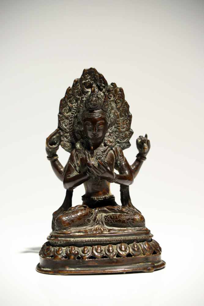 ShadakshariBronzeTibet19th ctH: 16 cmAvalokiteshvara Shadakshari sitting in padmasana (lotus pose)