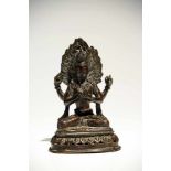 ShadakshariBronzeTibet19th ctH: 16 cmAvalokiteshvara Shadakshari sitting in padmasana (lotus pose)